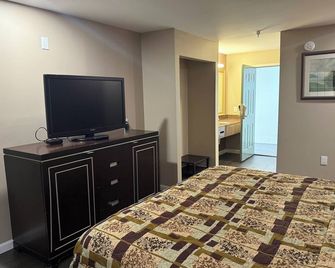 Magnolia Bay Hotel & Suites - Jonesboro - Slaapkamer
