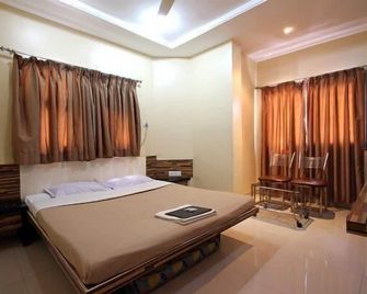 Hotel Vijay Residency - אוראנגאבד - חדר שינה