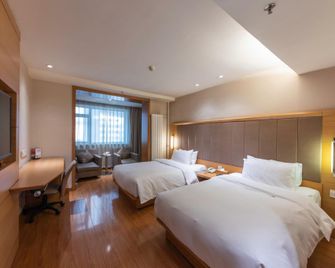 JI Hotel Urumqi Youhao Branch - Ürümqi - Schlafzimmer