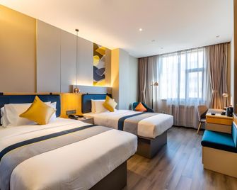 Home Inn Style Harbin Central Avenue St. Sophia Church - חרבין - חדר שינה