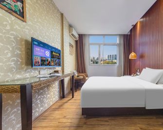 Bati Yangguang Chain Hotel Meizhou Meilong - Mej-čou - Ložnice
