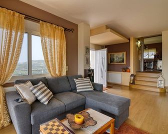 The House Olympia - Happy Rentals - Olympia - Вітальня