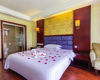 Hengda Hotel (High-speed Railway Station Branch) - Tongren - Bedroom