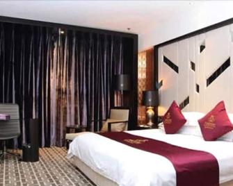 Tangshan Jinjiang Magnotel - Tangshan - Bedroom