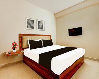 Hotel O Akshaya Enikepadu - Vijayawada - Bedroom