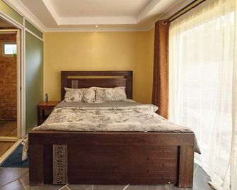 Jkia Boutique Inn - Nairobi - Chambre