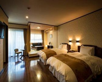 Pirika Rera Hotel - Shiraoi - Camera da letto