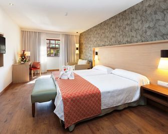 Hotel Marquesa - פוארטו דה לה קרוס - חדר שינה