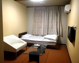 Hotel Kikuya - Kaminoyama - Slaapkamer
