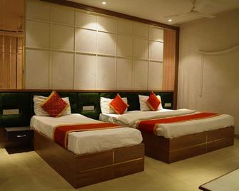 Hotel Queensland - Амрітсар - Спальня