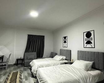 K boutique pyramids view west - Gizeh - Slaapkamer