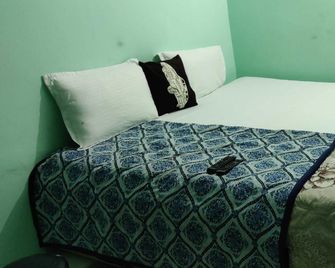 Hotel O Sushila Devi Guest House - Jeypore - Bedroom