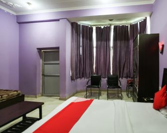OYO 48977 Hotel Alfa - Una - Bedroom