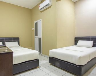 Lodge 37T - Ranau - Camera da letto