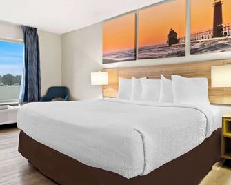 Days Inn & Suites by Wyndham Warren - Warren - Slaapkamer