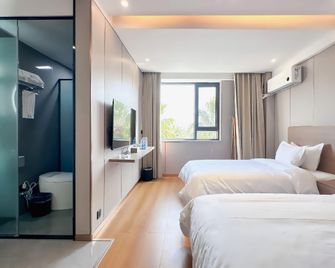 Yunsu Inn in Xichang City - Liangshan - Bedroom