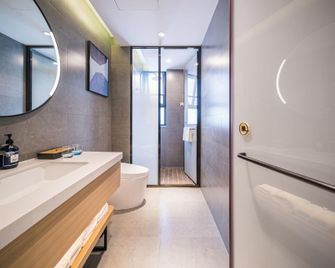 Starway Hotel (Tangshan Stadium Sun City Branch) - Tangshan - Schlafzimmer