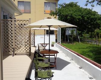 Apartment type room 202 where you can spend a rela / Kamo-gun Shizuoka - Kawazu - Patio