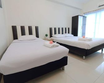 sk resort - בנגקוק - חדר שינה