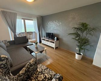 Ferienwohnung Sonnenstrahl - Friesenried - Olohuone