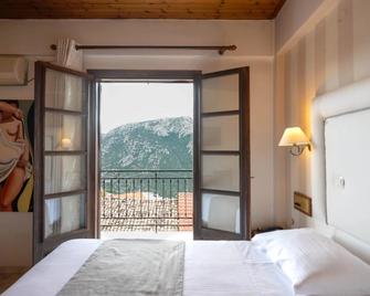 Kouros Hotel - Delphi - Ložnice