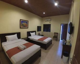 Alam Jogja Resort Mitra RedDoorz - Yogyakarta - Habitación