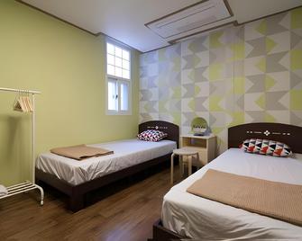 Cube Guesthouse - Seoul - Bedroom