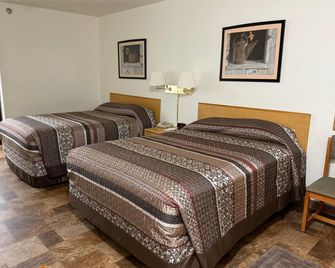 Travelodge Inn & Suites by Wyndham Deadwood - דדווד - חדר שינה