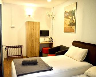 Drop Inn Lodge City Centre - Kuala Lumpur - Schlafzimmer