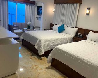 Halibut Hotel - La Romana - Sovrum
