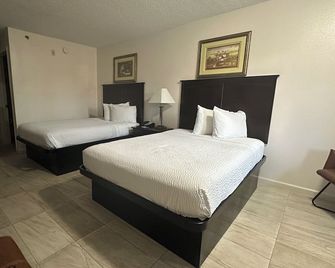 Carom Inn Denham Springs-Batonrouge - Denham Springs - Bedroom