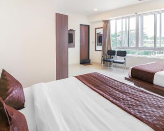 OYO Hotel Punarnava - Chikmagalur - Slaapkamer