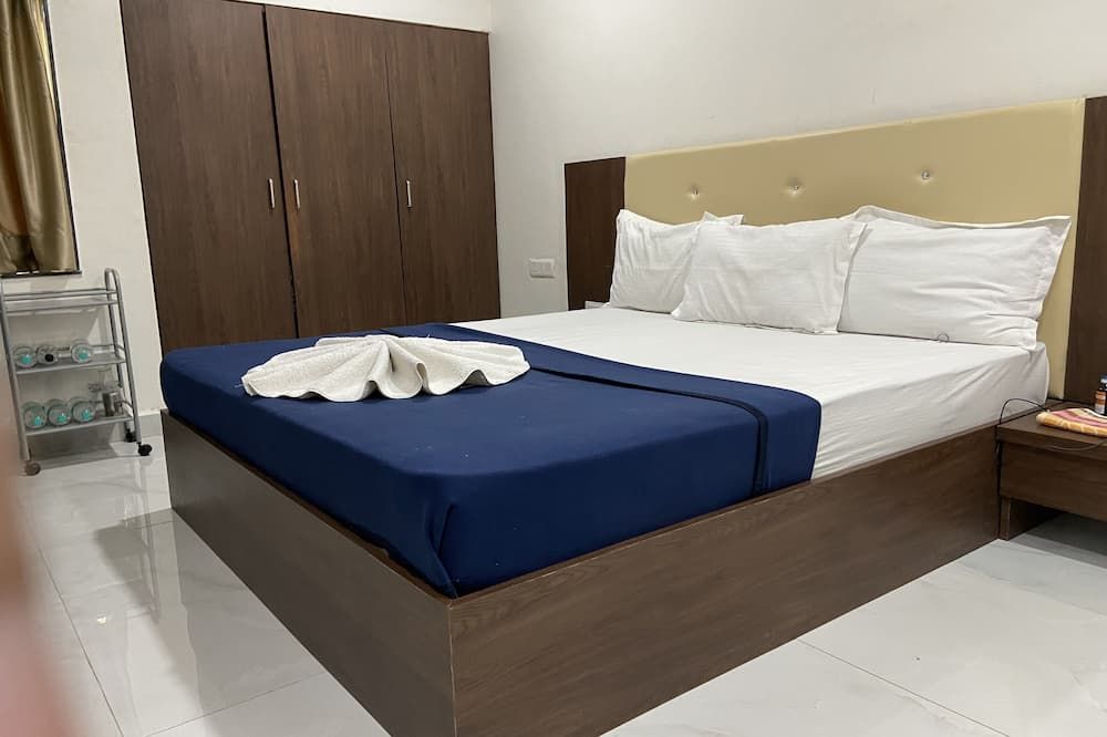 Hotel Millennium Plaza - Jamnagar - Schlafzimmer