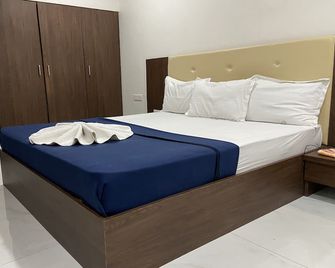 Hotel Millennium Plaza - Jamnagar - Schlafzimmer