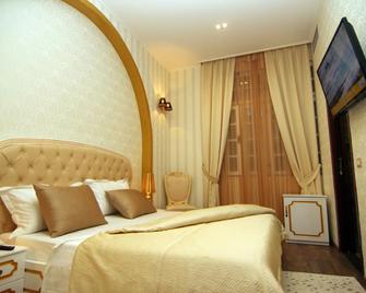 Hotel Boutique Restaurant Gloria - טיראנה - חדר שינה