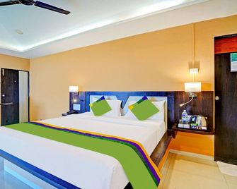 Treebo Vhyomaan Resort - Mahabaleshwar - Soveværelse