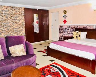 Limoh Suites - Benin City - Bedroom