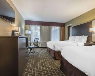 Quality Inn & Suites - ווינדזור - חדר שינה