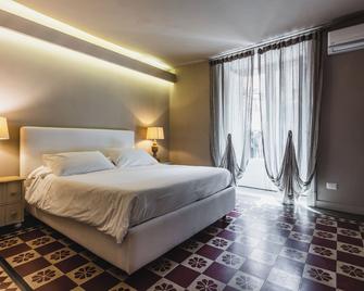 Ferrini Home - Piazza Trento - Catania - Schlafzimmer