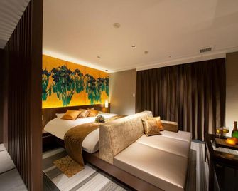 ホテルタイガー＆ドラゴン 男塾ホテルグループ - Gifu - Schlafzimmer