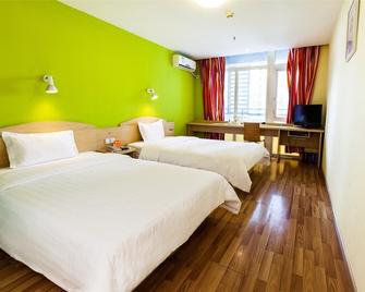 City Convenience Inn - Guilin - Bedroom