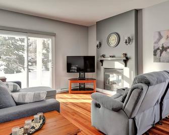Condo 2 Bedrooms Jardin des Sables - Orford - Living room