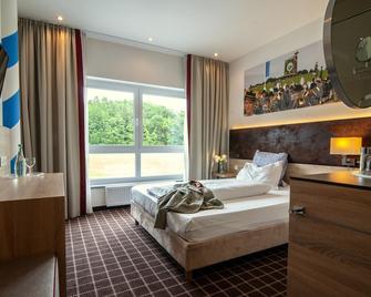 Business Class Hotel Ebersberg - Ebersberg - Bedroom