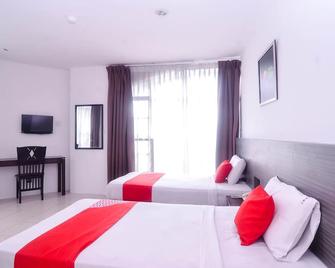 Mendu Inn - Kuching - Schlafzimmer