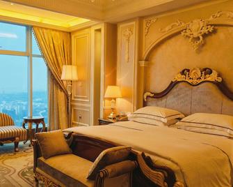 Jinshi International Hotel - Nantong - Bedroom