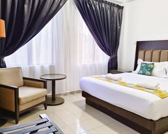 Salaam Suites Hotel - Kota Bahru - Schlafzimmer
