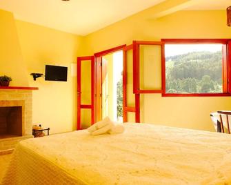Pousada Vista da Serra Monte Verde - Monte Verde - חדר שינה