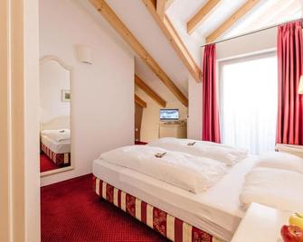 Hotel Trudnerhof im Naturpark Trudnerhorn - Trodena - Спальня