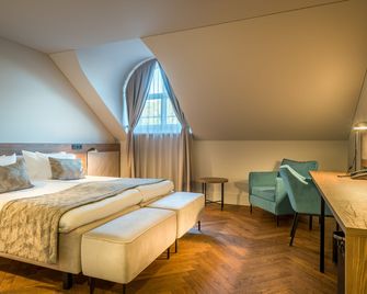 Hotel Vilnia - Vilna - Habitación
