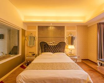 Guilin Jinshuiwan International Hotel - Guilin - Bedroom